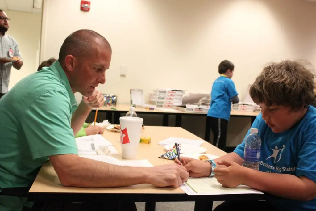 Bryan Olsen helps Little with homework 2014