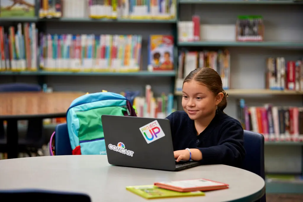 Student using a laptop.